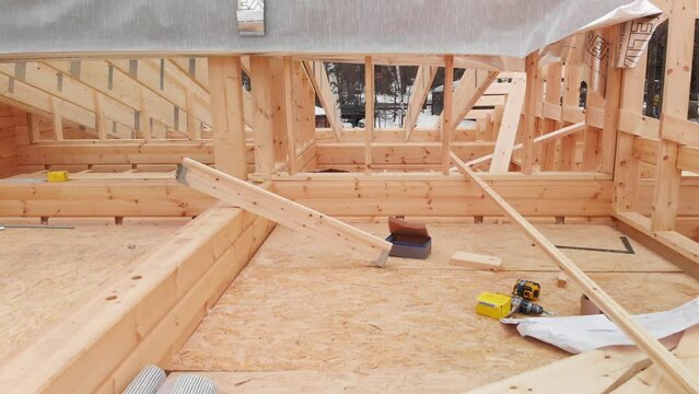 Aerial shot wooden construction of wooden roof