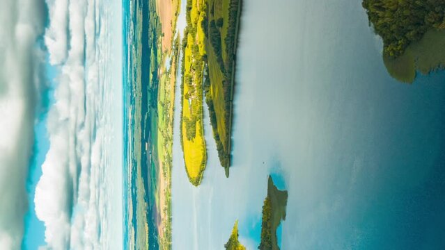 Vertical, Vertical Shot Time lapse Dronelapse Hyperlapse Of Residential Area With Houses In Countryside. Morning Fog Above Lepel Lake. Lyepyel District, Vitebsk Region, Belarus.