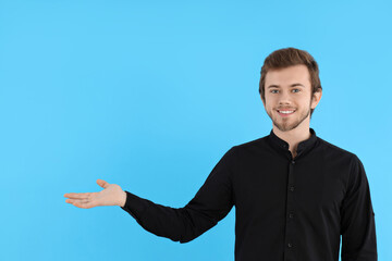 Concept of people, young man on blue background