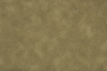 Texture of dark beige old paper, crumpled background. Vintage olive grunge surface backdrop.
