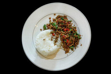 Top view of Minced beef with Thai basil on rice, focus selective