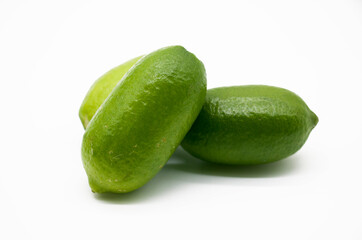 fresh green Lemon isolated on white background.