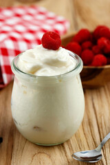 A Jar of Yoghurt with Wild Raspberries