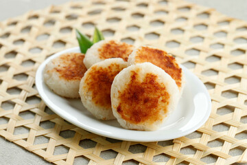 Round Wingko Babat, Traditional Indonesian Snack Made from Glutinous Rice Flour, Sugar, and Grated Young Coconut.
