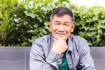 Portrait of Asian Senior retirement Man in coffee shop cafe happy lifestyle © Sun Image