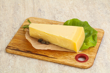 Traditional delicous Parmesan cheese over borad