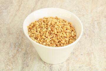 Crunched roasted peanut in the bowl