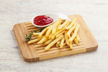 French fried potato over board