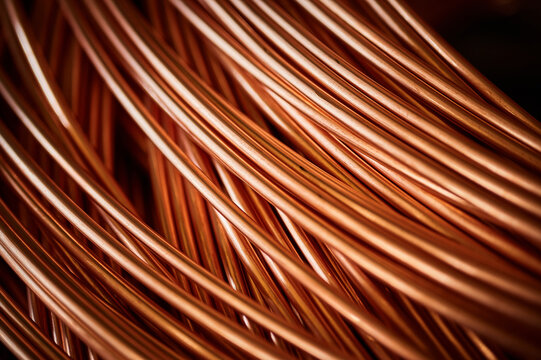 Shiny winded copper cable in warehouse of production plant