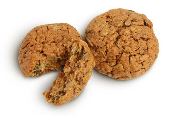 oatmeal cookies with flax, pumpkin and sunflower seeds isolated on white background with full depth of field. Top view. Flat lay