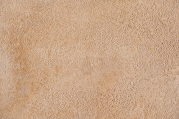 Fototapeta na wymiar Close-up of rough limestone surface. Shell rock coquina texture. Natural background