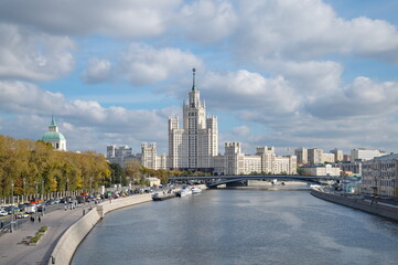 Fototapeta na wymiar Moscow, Russia - September 29, 2021: Autumn view of Moskvoretskaya embankment and a high-rise building on Kotelnicheskaya embankment