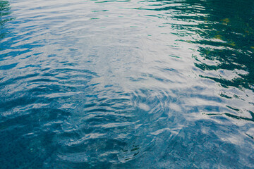 water surface in blue swimming pool