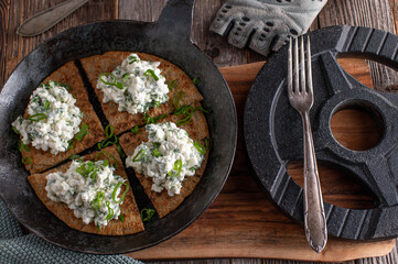 Fitness meal with oatmeal pancake, cottage cheese and herbs