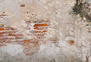 red brick block wall texture old background ancient weathered brick wall with cracks and destroyed stucco layer with copy space