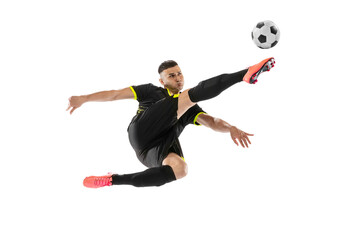 Professional male football soccer player in motion and action isolated on white studio background....