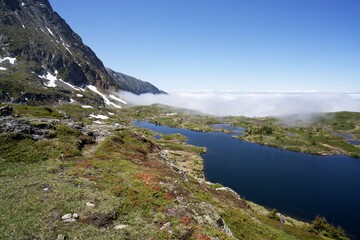 view from the top of the mountain and a lake
