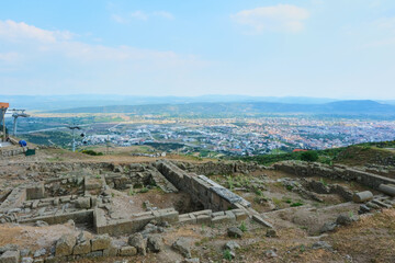 Fototapeta premium Acropolis of Pergamon Archeological City Ruins With Modern Bergama City Landscape For Compare. Selective Focus