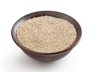 Uncooked white quinoa seeds in ceramic bowl isolated on white background with clipping path