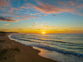 Aerial sunrise seascape with  high cloud