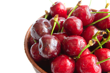Bunch of fresh organic sweet cherries on white background Clean eating concept Healthy nutritious vegan snack, raw diet