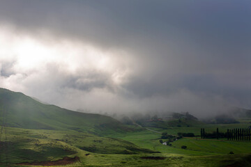 Low clouds early in the morning over the green valley