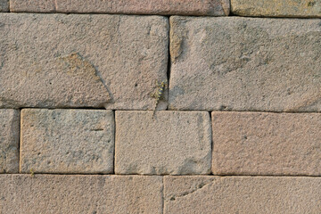 Closeup and Selective Focus Ancient Rock Blocks or Stone Bricks Wall For Design Text Place