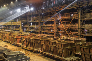 Fototapeta premium Wagons with scrap metal at steel mill.