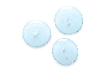 Blue drops of gel closeup. Cosmetic product for skin care. Isolated on white