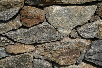 Fototapeta premium Natural stone wall in a garden