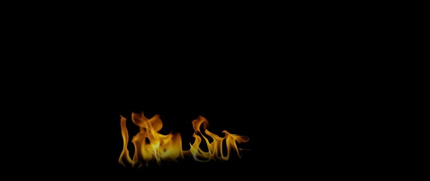 Fire Flames Igniting And Burning, Fiery orange glowing. Abstract background on the theme of fire. Real flames ignite. Royalty high-quality free stock footage of  flames isolated on black background
