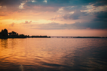 Fototapeta na wymiar Summer sunny evening on the banks of the Dnieper River.