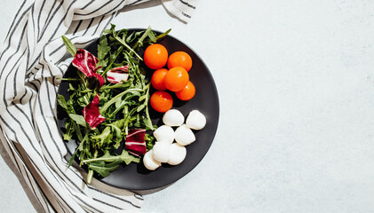 White plate with salad