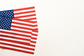 Obraz premium Concept of Independence day or Memorial day. Flag over bright marble table background.