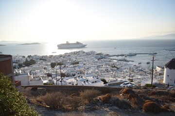 hill side view village ocean ship