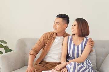 Fototapeta premium romantic happy young couple relax at modern home indoors