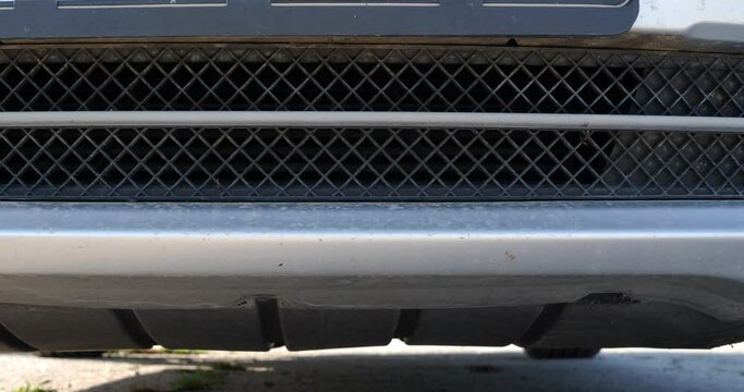 Dirty car front grille details.