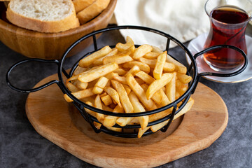 Fried potatoes. Homemade fried potatoes on a dark background. close-up