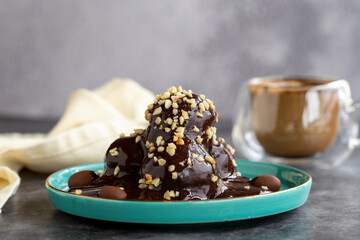 Profiterole cake. Pastry product. Profiterole cake on dark background. Close-up