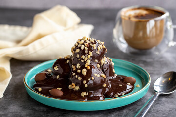 Profiterole cake. Pastry product. Profiterole cake on dark background. Close-up