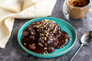 Profiterole cake. Pastry product. Profiterole cake on dark background. Close-up