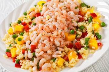 shrimps and millet pilaf with mango and veggies