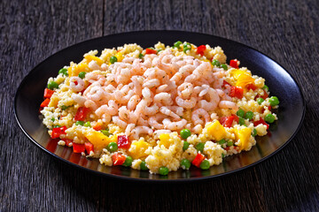 shrimps and millet pilaf with mango and veggies