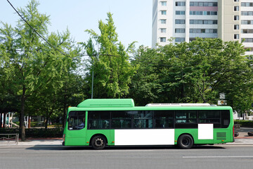 Fototapeta na wymiar Bus on the road in Seoul, Bus billboards