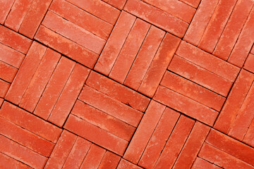 The geometric background and texture are made of natural red brick.The folded pattern of...