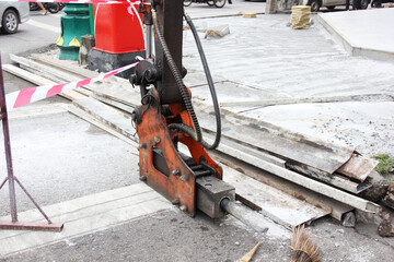 Construction site road drilling machine