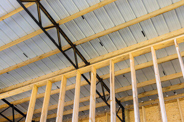 Built unfinish roof of large modern storage bilding construction site