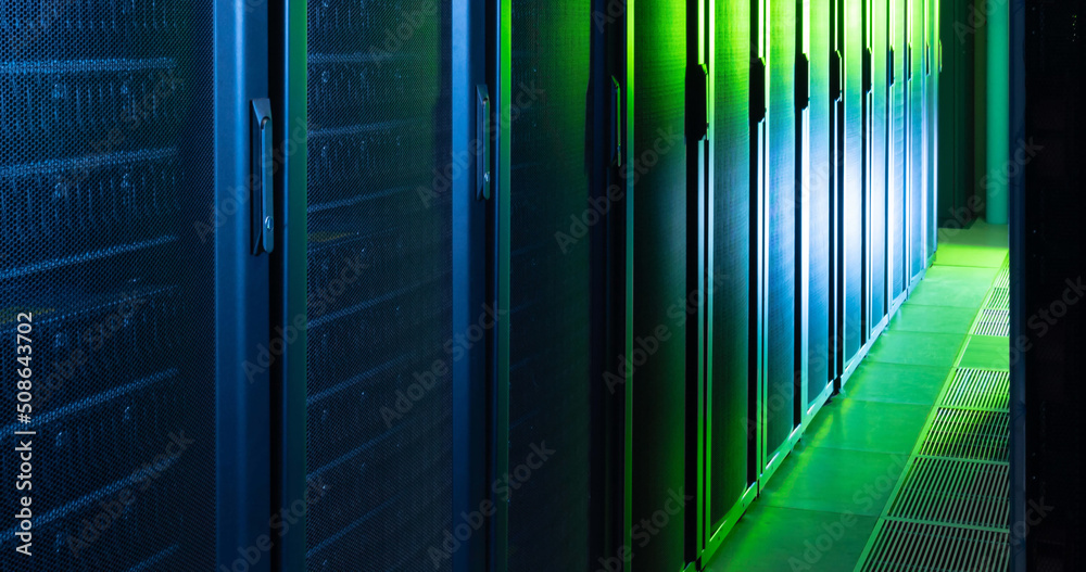 Poster image of empty corridor with row of blue and green computer servers