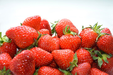 ripe, red strawberries on a white background. fresh berries.