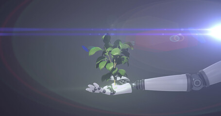 Image of growing plant in hand of robot arm, with blue light on dark background